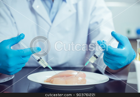 To use this stock image in your creative project, please select the size you need over to the right and click the "Add to Cart" button.
Your downloaded image will come with the Cutcaster watermark removed so don’t worry about the watermark you see on this page. Food scientist injecting raw chicken stock photo, Food scientist injecting raw chicken at the university by Wavebreak Media