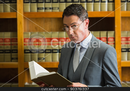 To use this stock image in your creative project, please select the size you need over to the right and click the "Add to Cart" button.
Your downloaded image will come with the Cutcaster watermark removed so don’t worry about the watermark you see on this page. Lawyer reading book in the law library stock photo, Lawyer reading book in the law library at the university by Wavebreak Media