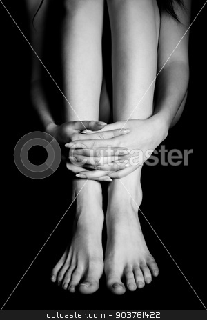 To use this stock image in your creative project, please select the size you need over to the right and click the "Add to Cart" button.
Your downloaded image will come with the Cutcaster watermark removed so don’t worry about the watermark you see on this page. melancholy stock photo, The young beautiful girl sits embracing the feet on a black background. Black and White by Suchota