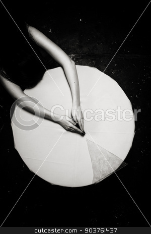 To use this stock image in your creative project, please select the size you need over to the right and click the "Add to Cart" button.
Your downloaded image will come with the Cutcaster watermark removed so don’t worry about the watermark you see on this page. White Circle stock photo, White circle Broken glass Hands Shallow depth of field Toned BW by Suchota