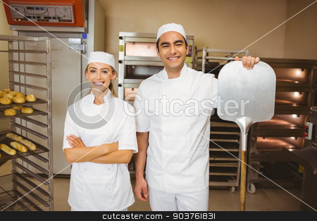 To use this stock image in your creative project, please select the size you need over to the right and click the "Add to Cart" button.
Your downloaded image will come with the Cutcaster watermark removed so don’t worry about the watermark you see on this page. Team of bakers smiling at camera stock photo, Team of bakers smiling at camera in a commercial kitchen by Wavebreak Media