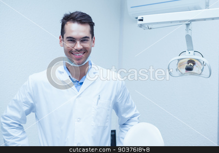 To use this stock image in your creative project, please select the size you need over to the right and click the "Add to Cart" button.
Your downloaded image will come with the Cutcaster watermark removed so don’t worry about the watermark you see on this page. Portrait of smiling male dentist stock photo, Portrait of smiling young male dentist by Wavebreak Media