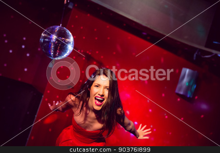 To use this stock image in your creative project, please select the size you need over to the right and click the "Add to Cart" button.
Your downloaded image will come with the Cutcaster watermark removed so don’t worry about the watermark you see on this page. Pretty brunette dancing and smiling stock photo, Pretty brunette dancing and smiling at the nightclub by Wavebreak Media
