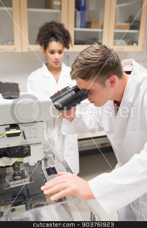 To use this stock image in your creative project, please select the size you need over to the right and click the "Add to Cart" button.
Your downloaded image will come with the Cutcaster watermark removed so don’t worry about the watermark you see on this page. Young scientist working with microscope stock photo, Young scientist working with microscope at the university by Wavebreak Media