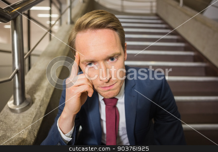 To use this stock image in your creative project, please select the size you need over to the right and click the "Add to Cart" button.
Your downloaded image will come with the Cutcaster watermark removed so don’t worry about the watermark you see on this page. Stressed businessman sitting on steps stock photo, Stressed businessman sitting on steps in office building by Wavebreak Media