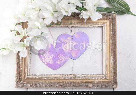 To use this stock image in your creative project, please select the size you need over to the right and click the "Add to Cart" button.
Your downloaded image will come with the Cutcaster watermark removed so don’t worry about the watermark you see on this page. Valentines Day background with hearts stock photo, Valentines Day background with hearts in retro frame by Oleksandr Solonenko