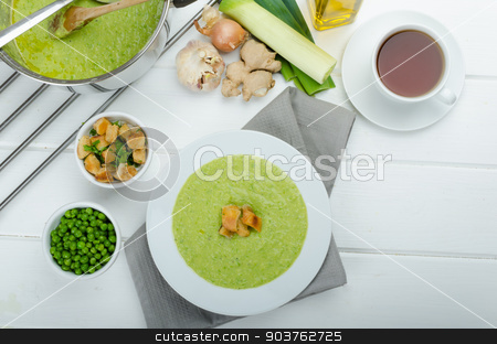 To use this stock image in your creative project, please select the size you need over to the right and click the "Add to Cart" button.
Your downloaded image will come with the Cutcaster watermark removed so don’t worry about the watermark you see on this page. Soup of young peas stock photo, Soup of young peas, homemade crispy croutons and tea by Peteer