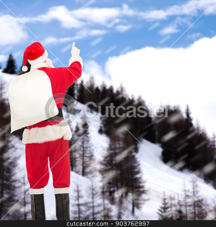 To use this stock image in your creative project, please select the size you need over to the right and click the "Add to Cart" button.
Your downloaded image will come with the Cutcaster watermark removed so don’t worry about the watermark you see on this page. man in costume of santa claus with bag stock photo, christmas, holidays and people concept - man in costume of santa claus with bag pointing finger from back over snowy mountains background by Syda Productions