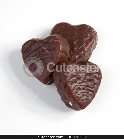 To use this stock image in your creative project, please select the size you need over to the right and click the "Add to Cart" button.
Your downloaded image will come with the Cutcaster watermark removed so don’t worry about the watermark you see on this page. Chocolated Hearts stock photo, Chocolate hearts isolated on a white background. by Scott Sanders