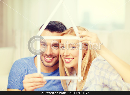 To use this stock image in your creative project, please select the size you need over to the right and click the "Add to Cart" button.
Your downloaded image will come with the Cutcaster watermark removed so don’t worry about the watermark you see on this page. smiling couple with house from measuring tape stock photo, moving, home and couple concept - smiling couple with house from measuring tape at new home by Syda Productions