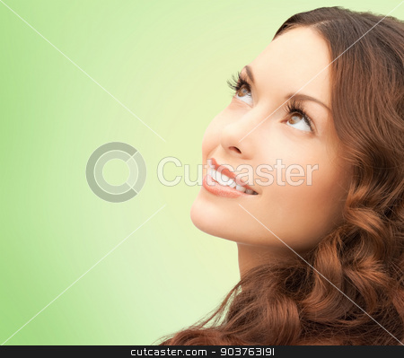 To use this stock image in your creative project, please select the size you need over to the right and click the "Add to Cart" button.
Your downloaded image will come with the Cutcaster watermark removed so don’t worry about the watermark you see on this page. beautiful young woman face stock photo, beauty, people and health concept - beautiful young woman looking up over green background by Syda Productions