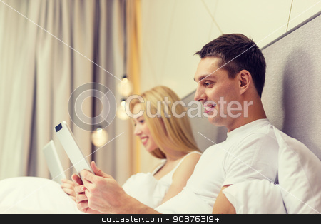To use this stock image in your creative project, please select the size you need over to the right and click the "Add to Cart" button.
Your downloaded image will come with the Cutcaster watermark removed so don’t worry about the watermark you see on this page. smiling couple in bed with tablet pc computers stock photo, hotel, travel, relationships, technology, intermet and happiness concept - smiling couple in bed with tablet computers by Syda Productions