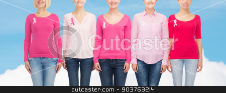 To use this stock image in your creative project, please select the size you need over to the right and click the "Add to Cart" button.
Your downloaded image will come with the Cutcaster watermark removed so don’t worry about the watermark you see on this page. close up of women with cancer awareness ribbons stock photo, healthcare, people and medicine concept - close up of smiling women in blank shirts with pink breast cancer awareness ribbons over blue sky and white cloud background by Syda Productions