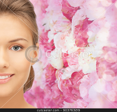 To use this stock image in your creative project, please select the size you need over to the right and click the "Add to Cart" button.
Your downloaded image will come with the Cutcaster watermark removed so don’t worry about the watermark you see on this page. beautiful young woman half face stock photo, beauty, people and health concept - beautiful young woman face over pink floral background by Syda Productions