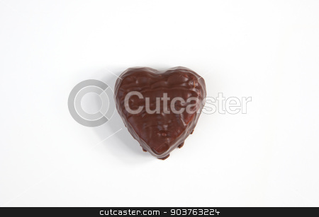 To use this stock image in your creative project, please select the size you need over to the right and click the "Add to Cart" button.
Your downloaded image will come with the Cutcaster watermark removed so don’t worry about the watermark you see on this page. Chocolate Heart stock photo, A chocolated heart on a white background. by Scott Sanders