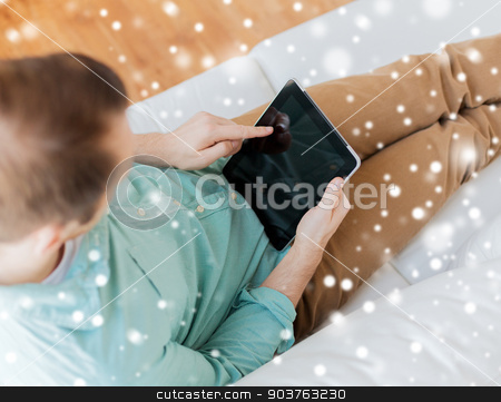 To use this stock image in your creative project, please select the size you need over to the right and click the "Add to Cart" button.
Your downloaded image will come with the Cutcaster watermark removed so don’t worry about the watermark you see on this page. close up of man with tablet pc computer at home stock photo, technology, leisure, lifestyle and advertisement concept - close up of man working with tablet pc computer sitting on sofa at home by Syda Productions
