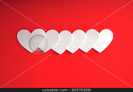 To use this stock image in your creative project, please select the size you need over to the right and click the "Add to Cart" button.
Your downloaded image will come with the Cutcaster watermark removed so don’t worry about the watermark you see on this page. White Hearts stock photo, White foam hearts on a red background. by Scott Sanders
