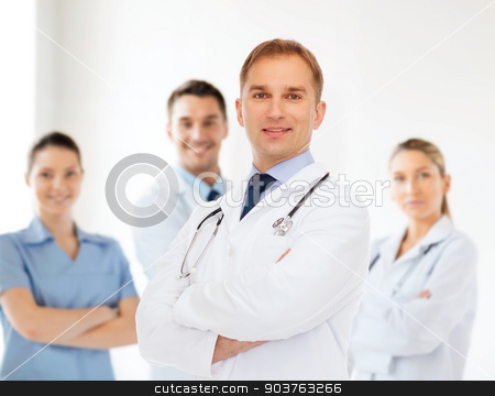 To use this stock image in your creative project, please select the size you need over to the right and click the "Add to Cart" button.
Your downloaded image will come with the Cutcaster watermark removed so don’t worry about the watermark you see on this page. smiling male doctor with stethoscope stock photo, healthcare, profession, teamwork, people and medicine concept - smiling male doctor with stethoscope in white coat over over group of medics by Syda Productions