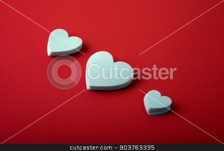 To use this stock image in your creative project, please select the size you need over to the right and click the "Add to Cart" button.
Your downloaded image will come with the Cutcaster watermark removed so don’t worry about the watermark you see on this page. White Hearts stock photo, White foam hearts on a red background. by Scott Sanders