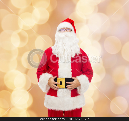 To use this stock image in your creative project, please select the size you need over to the right and click the "Add to Cart" button.
Your downloaded image will come with the Cutcaster watermark removed so don’t worry about the watermark you see on this page. man in costume of santa claus stock photo, christmas, holidays and people concept - man in costume of santa claus over beige lights background by Syda Productions