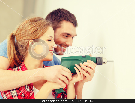 To use this stock image in your creative project, please select the size you need over to the right and click the "Add to Cart" button.
Your downloaded image will come with the Cutcaster watermark removed so don’t worry about the watermark you see on this page. smiling couple drilling hole in wall at home stock photo, repair, interior design, building, renovation and home concept - smiling couple drilling hole in wall at home by Syda Productions