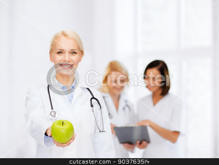 To use this stock image in your creative project, please select the size you need over to the right and click the "Add to Cart" button.
Your downloaded image will come with the Cutcaster watermark removed so don’t worry about the watermark you see on this page. smiling female doctor with green apple stock photo, healthcare and medicine concept - smiling female doctor with stethoscope and green apple by Syda Productions