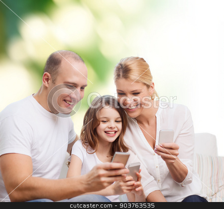 To use this stock image in your creative project, please select the size you need over to the right and click the "Add to Cart" button.
Your downloaded image will come with the Cutcaster watermark removed so don’t worry about the watermark you see on this page. happy family with smartphones stock photo, family, summer, technology and people concept - smiling mother, father and little girl with smartphones over green background by Syda Productions