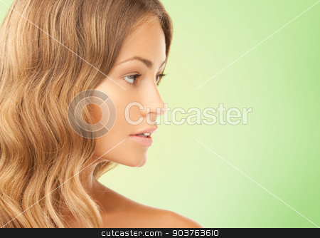 To use this stock image in your creative project, please select the size you need over to the right and click the "Add to Cart" button.
Your downloaded image will come with the Cutcaster watermark removed so don’t worry about the watermark you see on this page. beautiful young woman face stock photo, beauty, people and health concept - beautiful young woman face over green background by Syda Productions
