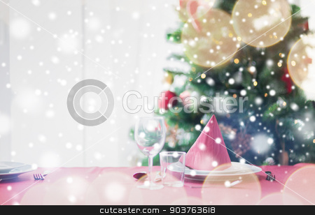 To use this stock image in your creative project, please select the size you need over to the right and click the "Add to Cart" button.
Your downloaded image will come with the Cutcaster watermark removed so don’t worry about the watermark you see on this page. room with christmas tree and decorated table stock photo, holidays, celebration and home concept - close up of room with christmas tree and decorated table by Syda Productions