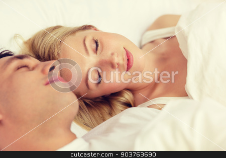 To use this stock image in your creative project, please select the size you need over to the right and click the "Add to Cart" button.
Your downloaded image will come with the Cutcaster watermark removed so don’t worry about the watermark you see on this page. happy couple sleeping in bed stock photo, hotel, travel, relationships, and happiness concept - happy couple sleeping in bed by Syda Productions