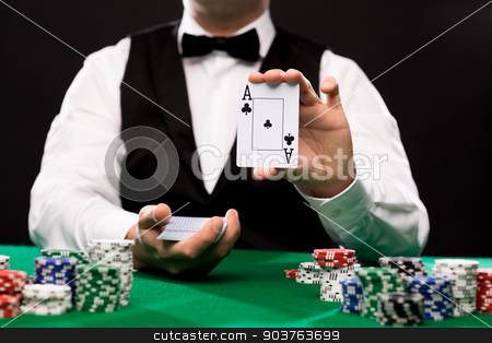 To use this stock image in your creative project, please select the size you need over to the right and click the "Add to Cart" button.
Your downloaded image will come with the Cutcaster watermark removed so don’t worry about the watermark you see on this page. holdem dealer with playing cards and casino chips stock photo, casino, gambling, poker, people and entertainment concept - close up of holdem dealer with playing cards and chips on green table by Syda Productions