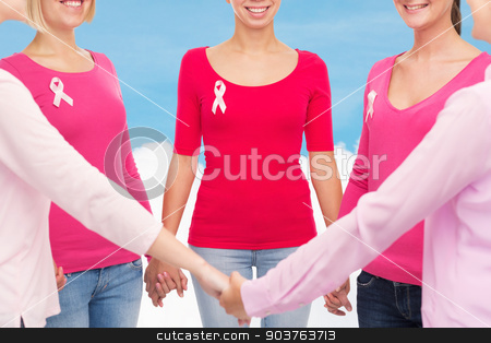 To use this stock image in your creative project, please select the size you need over to the right and click the "Add to Cart" button.
Your downloaded image will come with the Cutcaster watermark removed so don’t worry about the watermark you see on this page. close up of women with cancer awareness ribbons stock photo, healthcare, people and medicine concept - close up of smiling women in blank shirts with pink breast cancer awareness ribbons holding hands over blue sky and white cloud background by Syda Productions