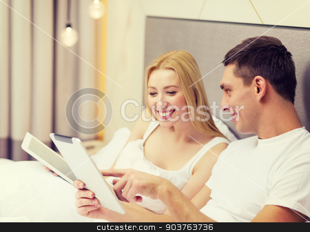 To use this stock image in your creative project, please select the size you need over to the right and click the "Add to Cart" button.
Your downloaded image will come with the Cutcaster watermark removed so don’t worry about the watermark you see on this page. smiling couple in bed with tablet pc computers stock photo, hotel, travel, relationships, technology, intermet and happiness concept - smiling couple in bed with tablet computers by Syda Productions