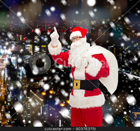 To use this stock image in your creative project, please select the size you need over to the right and click the "Add to Cart" button.
Your downloaded image will come with the Cutcaster watermark removed so don’t worry about the watermark you see on this page. man in costume of santa claus with bag stock photo, christmas, holidays, gesture and people concept - man in costume of santa claus with bag pointing finger up over snowy night city background by Syda Productions