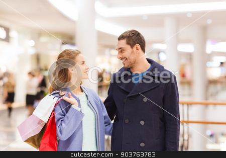To use this stock image in your creative project, please select the size you need over to the right and click the "Add to Cart" button.
Your downloaded image will come with the Cutcaster watermark removed so don’t worry about the watermark you see on this page. happy young couple with shopping bags in mall stock photo, sale, consumerism and people concept - happy young couple with shopping bags talking in mall by Syda Productions