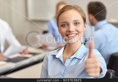 To use this stock image in your creative project, please select the size you need over to the right and click the "Add to Cart" button.
Your downloaded image will come with the Cutcaster watermark removed so don’t worry about the watermark you see on this page. group of smiling businesspeople meeting in office stock photo, business, people, gesture and teamwork concept - smiling businesswoman showing thumbs up with group of businesspeople meeting in office by Syda Productions