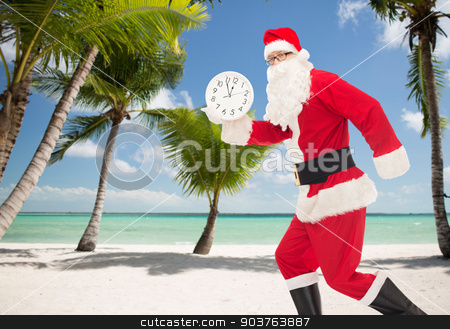 To use this stock image in your creative project, please select the size you need over to the right and click the "Add to Cart" button.
Your downloaded image will come with the Cutcaster watermark removed so don’t worry about the watermark you see on this page. man in costume of santa claus with clock stock photo, christmas, holidays and people concept - man in costume of santa claus running with clock showing twelve over tropical beach background by Syda Productions