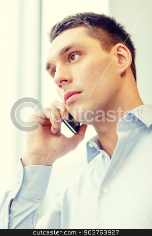 To use this stock image in your creative project, please select the size you need over to the right and click the "Add to Cart" button.
Your downloaded image will come with the Cutcaster watermark removed so don’t worry about the watermark you see on this page. serious businessman with smartphone stock photo, business, technology and office concept - serious businessman with smartphone by Syda Productions