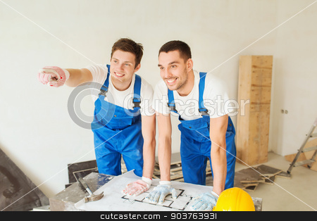 To use this stock image in your creative project, please select the size you need over to the right and click the "Add to Cart" button.
Your downloaded image will come with the Cutcaster watermark removed so don’t worry about the watermark you see on this page. smiling builders with blueprint stock photo, building, teamwork and people concept - smiling builders in hardhats with blueprint pointing finger indoors by Syda Productions