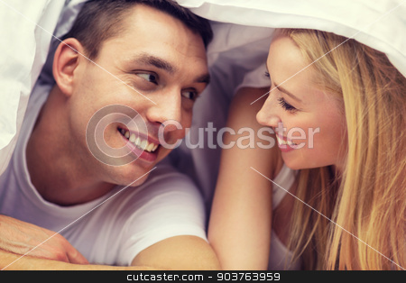 To use this stock image in your creative project, please select the size you need over to the right and click the "Add to Cart" button.
Your downloaded image will come with the Cutcaster watermark removed so don’t worry about the watermark you see on this page. happy couple sleeping in bed stock photo, hotel, travel, relationships, and happiness concept - happy couple in bed by Syda Productions