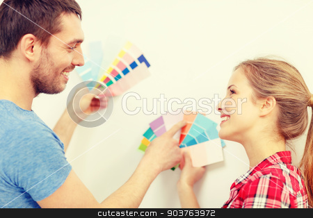 To use this stock image in your creative project, please select the size you need over to the right and click the "Add to Cart" button.
Your downloaded image will come with the Cutcaster watermark removed so don’t worry about the watermark you see on this page. smiling couple looking at color samples at home stock photo, repair, interior design, building, renovation and home concept - smiling couple looking at color samples at home by Syda Productions