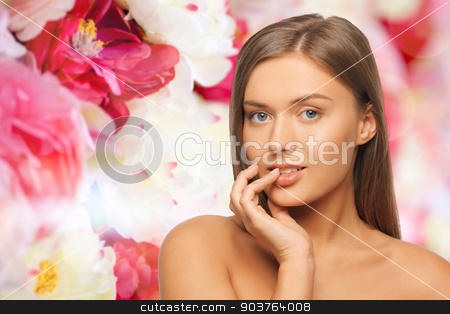 To use this stock image in your creative project, please select the size you need over to the right and click the "Add to Cart" button.
Your downloaded image will come with the Cutcaster watermark removed so don’t worry about the watermark you see on this page. beautiful young woman face stock photo, beauty, people and health concept - beautiful young woman touching her lips over pink floral background by Syda Productions