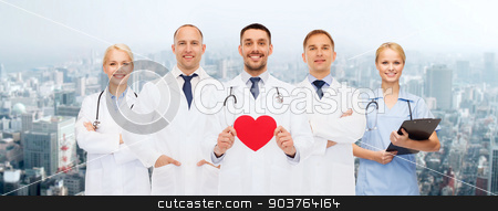 To use this stock image in your creative project, please select the size you need over to the right and click the "Add to Cart" button.
Your downloaded image will come with the Cutcaster watermark removed so don’t worry about the watermark you see on this page. group of smiling doctors with red heart shape stock photo, medicine, profession, teamwork and healthcare concept - group of smiling medics or doctors holding red paper heart shape, clipboard and stethoscopes over city background by Syda Productions