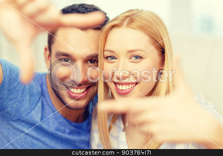 To use this stock image in your creative project, please select the size you need over to the right and click the "Add to Cart" button.
Your downloaded image will come with the Cutcaster watermark removed so don’t worry about the watermark you see on this page. smiling happy couple making frame gesture at home stock photo, love, family and happiness concept - smiling happy couple making frame gesture at home by Syda Productions