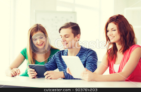 To use this stock image in your creative project, please select the size you need over to the right and click the "Add to Cart" button.
Your downloaded image will come with the Cutcaster watermark removed so don’t worry about the watermark you see on this page. smiling students with tablet pc at school stock photo, education, technology and internet concept - smiling students with tablet pc computers at school by Syda Productions