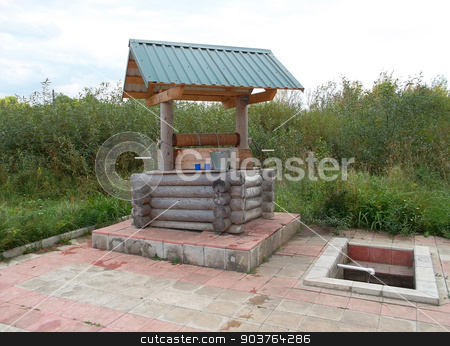 To use this stock image in your creative project, please select the size you need over to the right and click the "Add to Cart" button.
Your downloaded image will come with the Cutcaster watermark removed so don’t worry about the watermark you see on this page. Well in the Russian village stock photo, Well made of wooden logs in the Russian village amid tall grass. by IgorTravkin