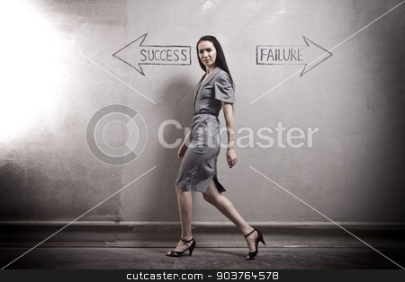 To use this stock image in your creative project, please select the size you need over to the right and click the "Add to Cart" button.
Your downloaded image will come with the Cutcaster watermark removed so don’t worry about the watermark you see on this page. Success - Failure stock photo, young girl against the old wall with graffiti. toned image. by Suchota