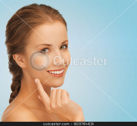 To use this stock image in your creative project, please select the size you need over to the right and click the "Add to Cart" button.
Your downloaded image will come with the Cutcaster watermark removed so don’t worry about the watermark you see on this page. beautiful young woman face stock photo, beauty, people and health concept - beautiful young woman touching her face over blue background by Syda Productions
