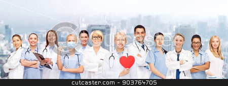 To use this stock image in your creative project, please select the size you need over to the right and click the "Add to Cart" button.
Your downloaded image will come with the Cutcaster watermark removed so don’t worry about the watermark you see on this page. smiling doctors and nurses with red heart stock photo, healthcare and medicine concept - smiling doctors and nurses with red heart by Syda Productions