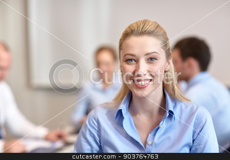 To use this stock image in your creative project, please select the size you need over to the right and click the "Add to Cart" button.
Your downloaded image will come with the Cutcaster watermark removed so don’t worry about the watermark you see on this page. group of smiling businesspeople meeting in office stock photo, business, people and teamwork concept - smiling businesswoman with group of businesspeople meeting in office by Syda Productions